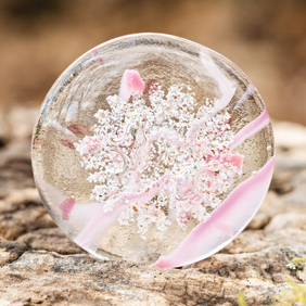 pink confetti streamers Bob Rock memorial artistic black glass with ash