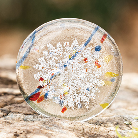 primary color confetti streamers Bob Rock memorial artistic black glass with ash